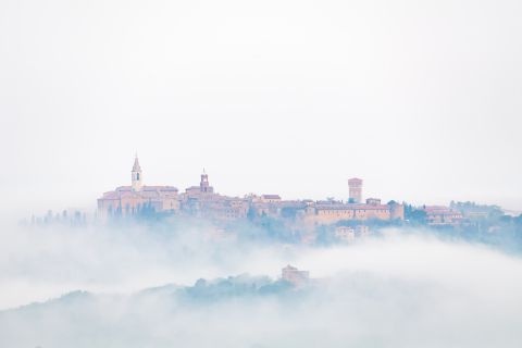 Village rising from the fog